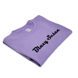 purple t shirt- folded, angle